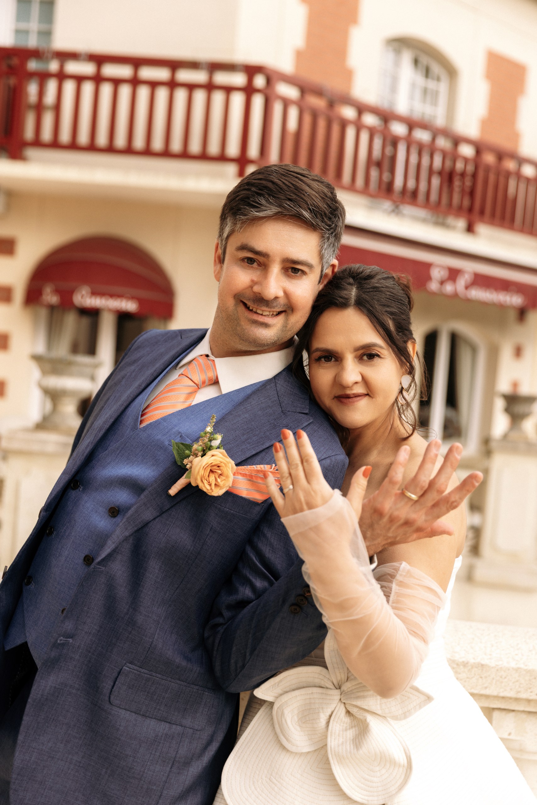 Ekaterina and Christoph showing their wedding rings